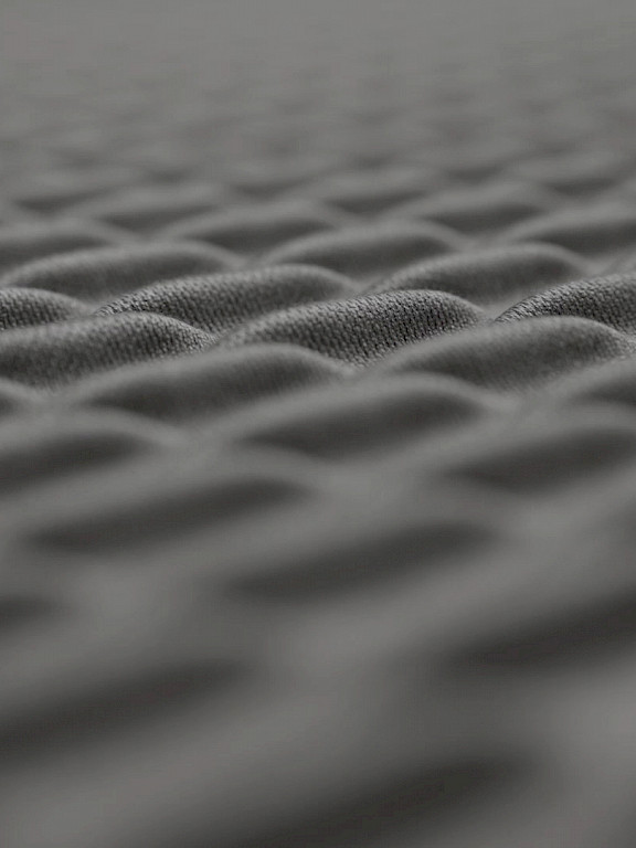 Close-up of the structured Ondo fabric used for the Serenity acoustic luminaire by Lightnet.