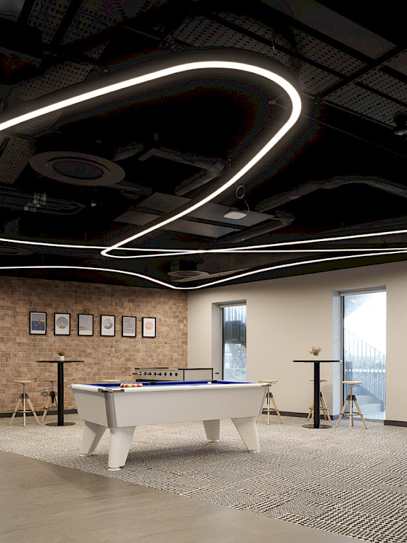 Modern office with curved LED light lines, pool table, lounge area and large window view.