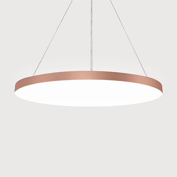 Basic round pendant luminaire with copper surface and central cable suspension.