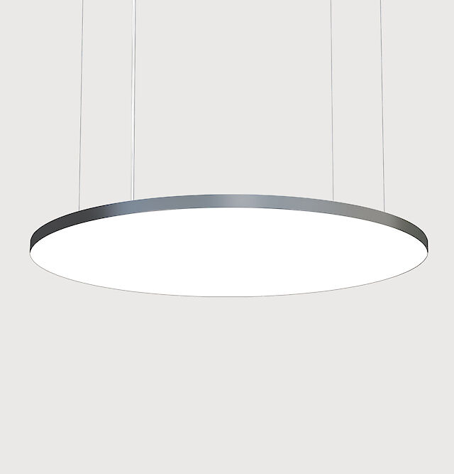 Round basic pendant luminaire with cable suspension and a grey luminaire body.